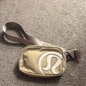 Lululemon Tan Crossbody Bag with White Logo